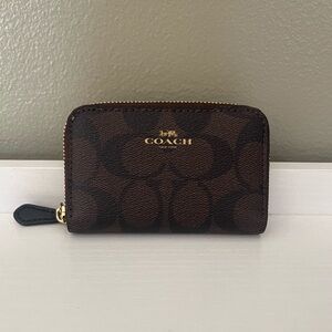 Coach zip around coin case in Signature Canvas
